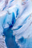 Close-up of a glacier with blue ice and crevasses