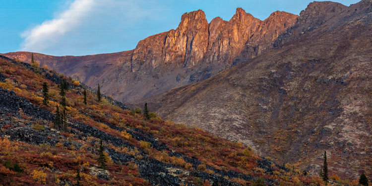 Sunset Glow on Rocky Peaks"
