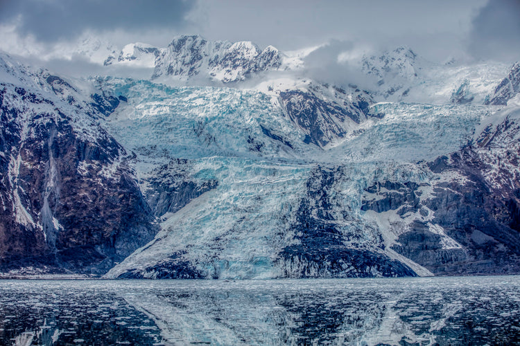 Veil of Ice Cascades Down Mountain Slopes