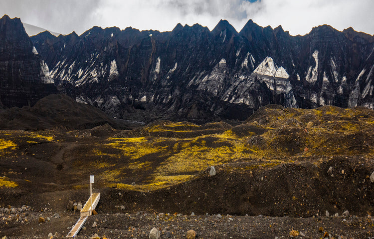 Midnight Peaks over a Volcanic Valley