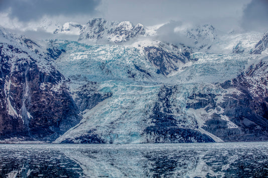 Veil of Ice Cascades Down Mountain Slopes